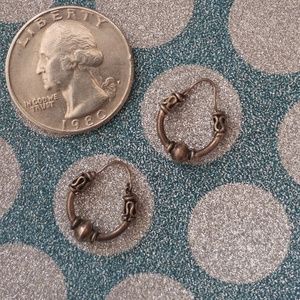 Delicate silver hoops